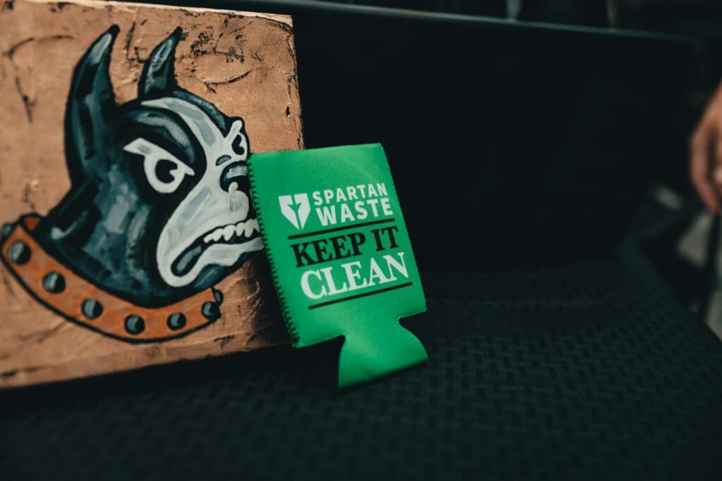 Spartan Waste Koozie Spartan Waste Keep It Clean Koozie collab with Wofford Athletics